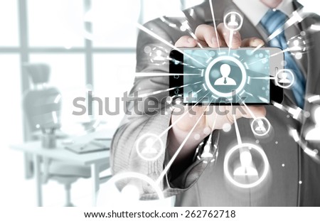 Business Hand holding a phone show the social network