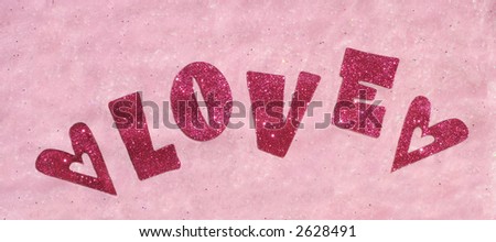 the word 'LOVE' with hearts on either side