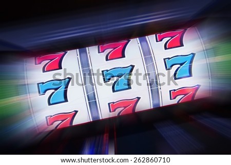 Triple Seven Slot Machine Win. Casino Classic Slot Machine Concept Photography. Royalty-Free Stock Photo #262860710