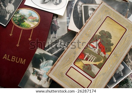 Old photographs with vintage box and family album