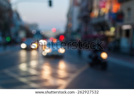 defocused picture of a street scene in the city with bokeh lights at night