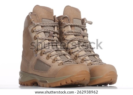 Pair of army boots isolated on a white background