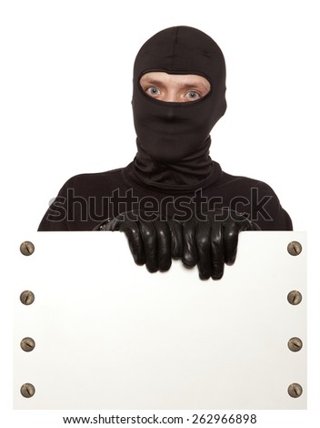 Ninja. Robber hiding behind a empty white sign with space for text. Isolated on white background