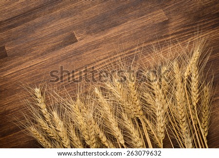 Wheat on vintage  wooden background. Top view