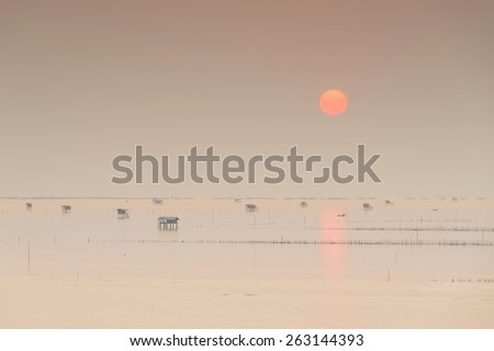Silhouette sunrise at Bangtaboon Bay, Thailand.
