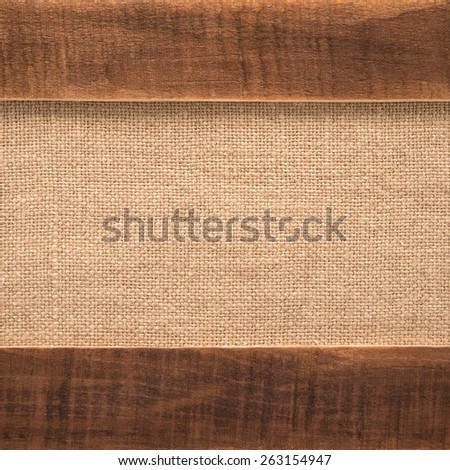 Texture of the old burlap and wood 

