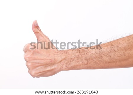 hairy man's hand giving thumb up gesture