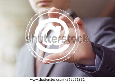 Businessman pressing messaging mail sending icon