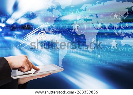 Businesswoman sending email by using digital tablet