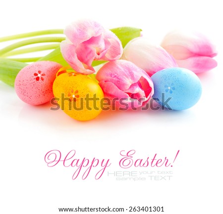 Easter eggs with pink tulip flowers on white background