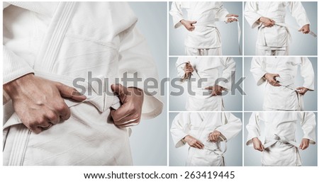 Karateka belt tying step by step pictures Royalty-Free Stock Photo #263419445