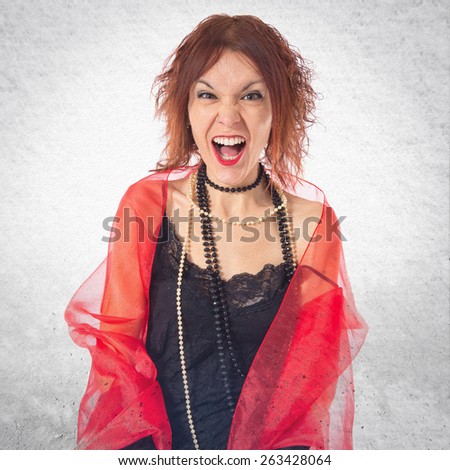 Woman in cabaret style shouting over textured background  