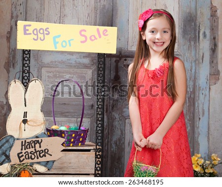 Eggs for Sale.  Attractive young girl selling Easter Eggs.