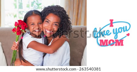 mothers day greeting against pretty mother sitting on the couch with her daughter holding roses
