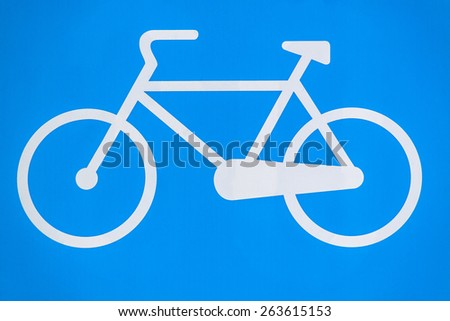 White bike logo isolated on blue background.
