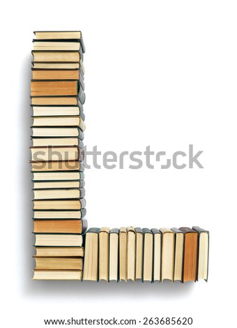 Letter L formed from the page ends of closed vintage hardcover books standing on a white background from a set or series of numbers