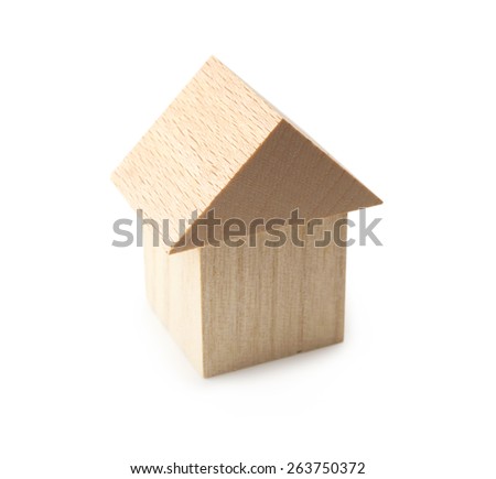 Wooden home or house isolated on white.