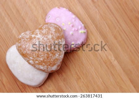 heart shape gingerbread Cookie over wooden background