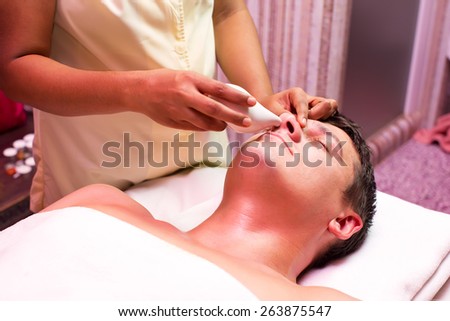 people man engaged in Ayurvedic spa treatment