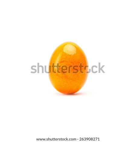 easter egg in orange color isolated on white