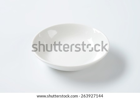 empty white bowl on white background Royalty-Free Stock Photo #263927144