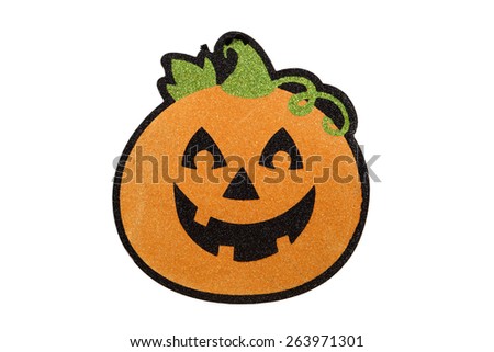 A glitter pumpkin sign against a white background