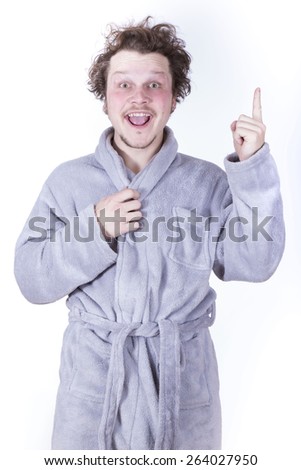 funny man with bathrobe on white background
