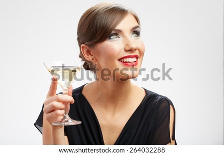 Portrait of toothy smiling woman holding glass with drink.Black evening dress. Girl celebrating event isolated portrait.