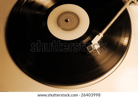 old vinyl player in sepia