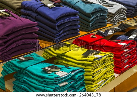 Colorful trousers, folded placed on Showcase.