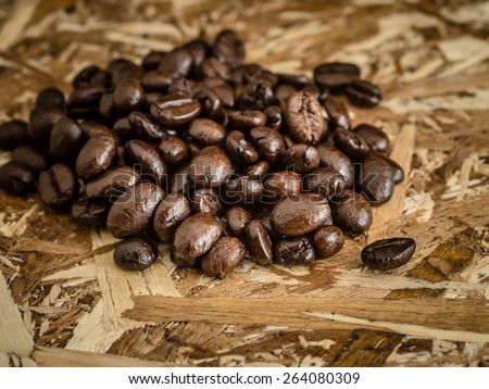 Coffee on grunge wooden background with filter effect retro vintage style