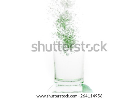 Bubbles in water over the glass