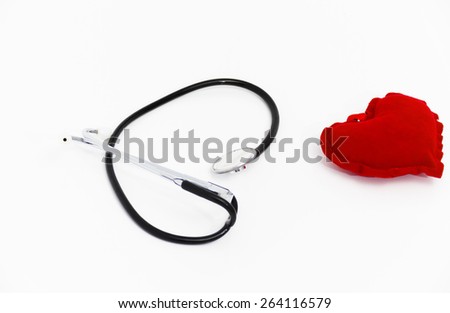 Photo of the Doctor's stethoscope listening to a healthy red heart, health concept, taking care about health