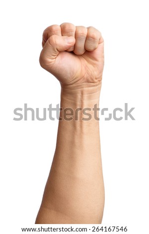 Male clenched fist, isolated on a white background Man hand with a fist. Alpha. Protest. Royalty-Free Stock Photo #264167546