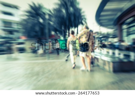 Abstract of blurred people walking around the shopping center
