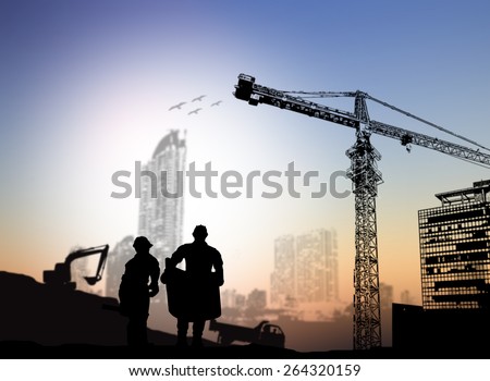 silhouette man engineer looking at blueprints Blurred construction site