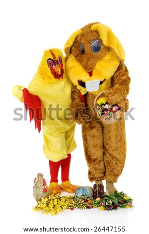 Easter bunny and chicken with basket filled with chocolate eggs on white background, reflective surface