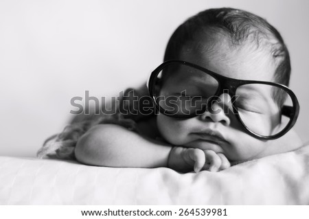 Black and White Image of Newborn Baby