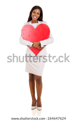 beautiful african american woman hugging red heart shape