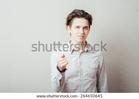 Closeup portrait happy young man giving thumb, finger fig gesture you are going to get zero nothing. Pozitive emotions, facial expressions, feelings, body language, signs