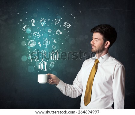 Businessman standing and holding a white cup with business icons coming out of the cup

