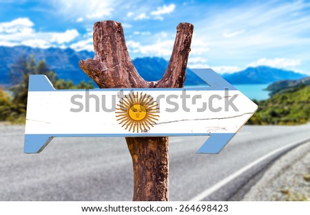 Argentina wooden sign with a road background