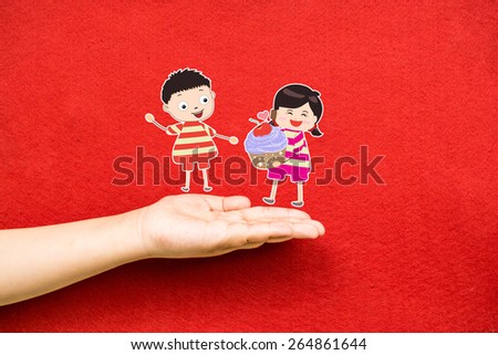 boy and girl with cupcake on a hand