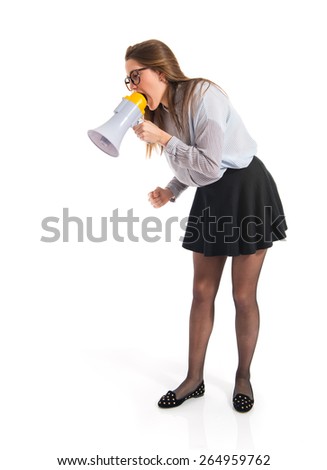 Girl shouting by megaphone  