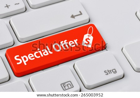 A keyboard with a red button - Special Offer