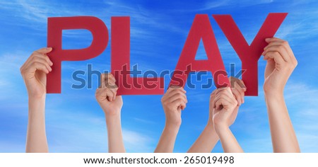 Many Caucasian People And Hands Holding Red Straight Letters Or Characters Building The English Word Play On Blue Sky