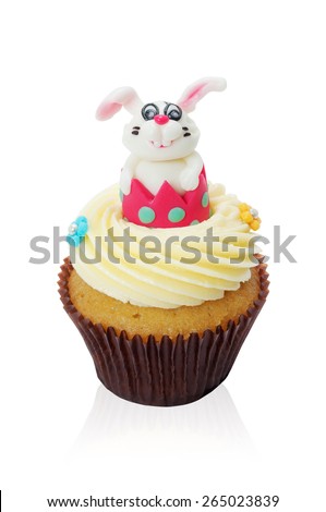 Easter cupcakes White rabbit in a beautiful crown on white background.