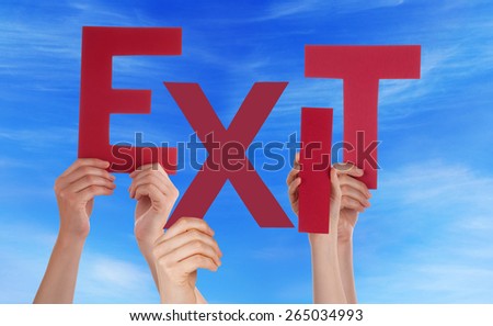 Many Caucasian People And Hands Holding Red Letters Or Characters Building The English Word Exit On Blue Sky
