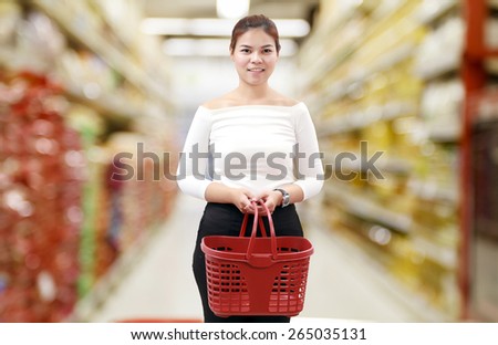 Asian woman shopping And hoarding vegetables, fruits, and food for living in the home