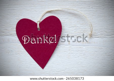 One Red Heart Label Or Tag With White Ribbon On White Wooden Background With German Text Danke Means Happy Thank You Vintage Retro Or Rustic Style With Frame